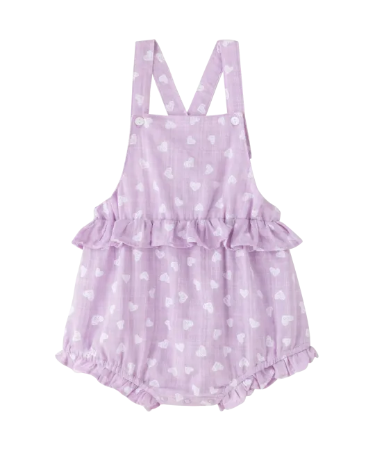 Lavender polka dot baby romper with shoulder straps and ruffled leg openings