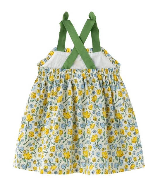 Yellow and white floral print dress with green crossback straps