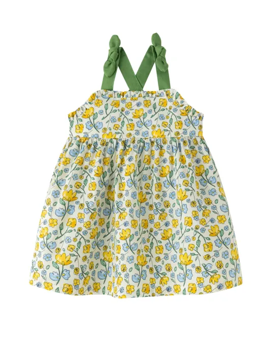 Toddler dress with green shoulder straps and yellow floral print on white background