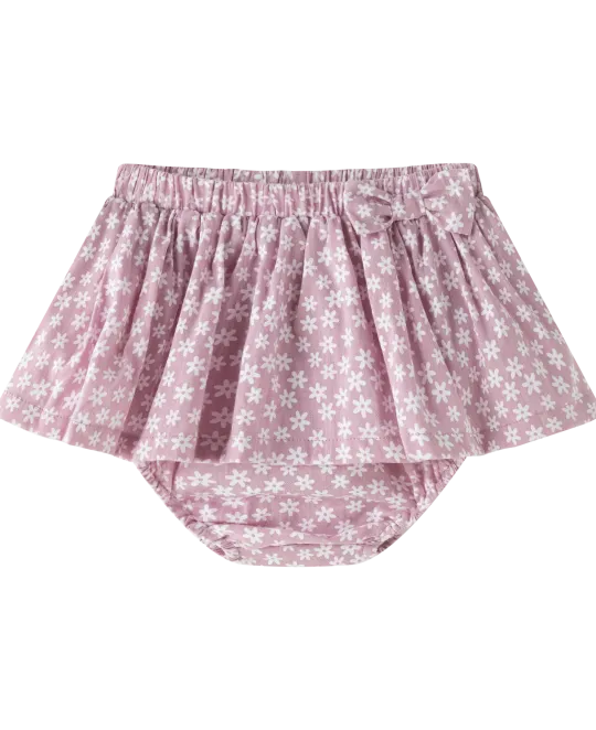 Pink polka dot skirted diaper cover with white elastic waistband