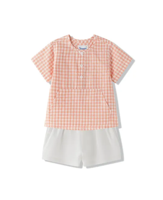 Two-piece outfit with coral gingham short-sleeve top and white shorts