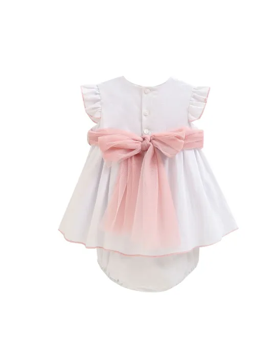 White infant dress with pink bow sash and matching diaper cover