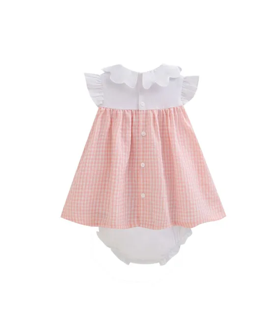 White and pink gingham baby dress with white bloomers and bow sleeves