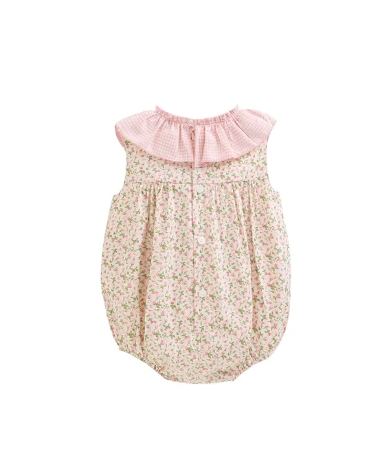 Baby romper with pink collar and beige floral print body