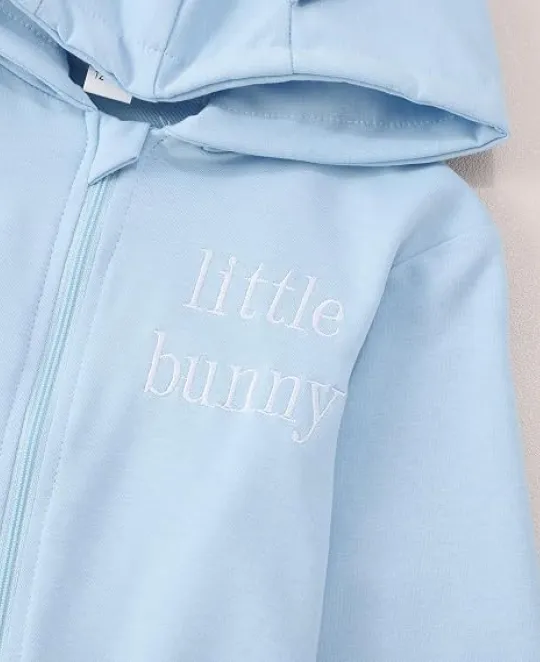 Light blue zip-up hoodie with embroidered text on chest