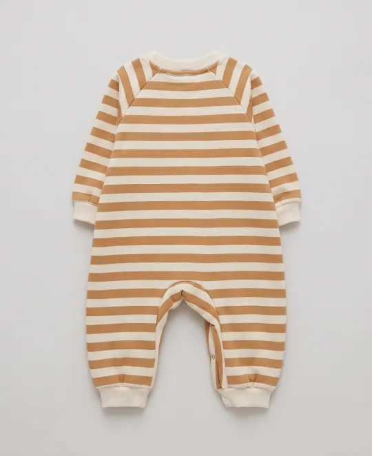 Baby romper with horizontal tan and cream stripes, long sleeves, and snap leg openings