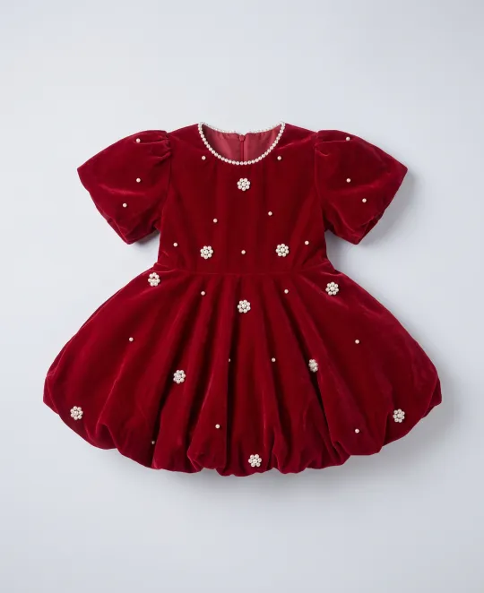 Burgundy velvet dress with gold star embroidery and short sleeves