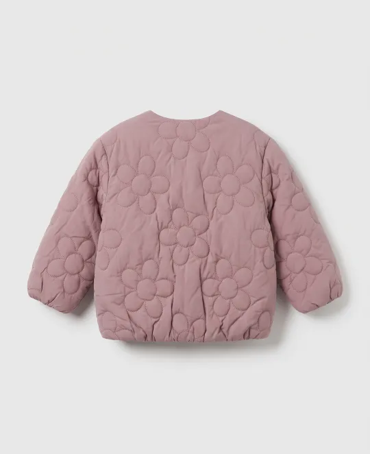 Dusty pink quilted jacket with long sleeves laid flat on white background