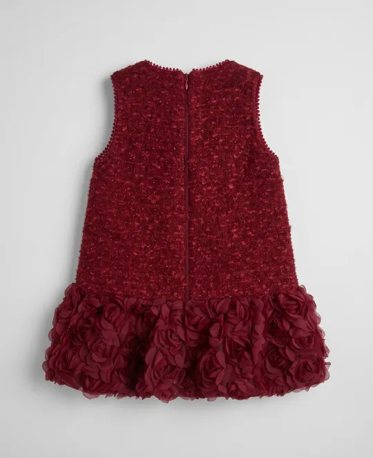 Burgundy sleeveless dress with textured fabric and ruffled hem