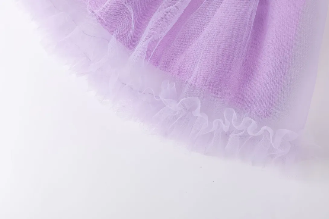 Purple tulle fabric with sparkly glitter detail