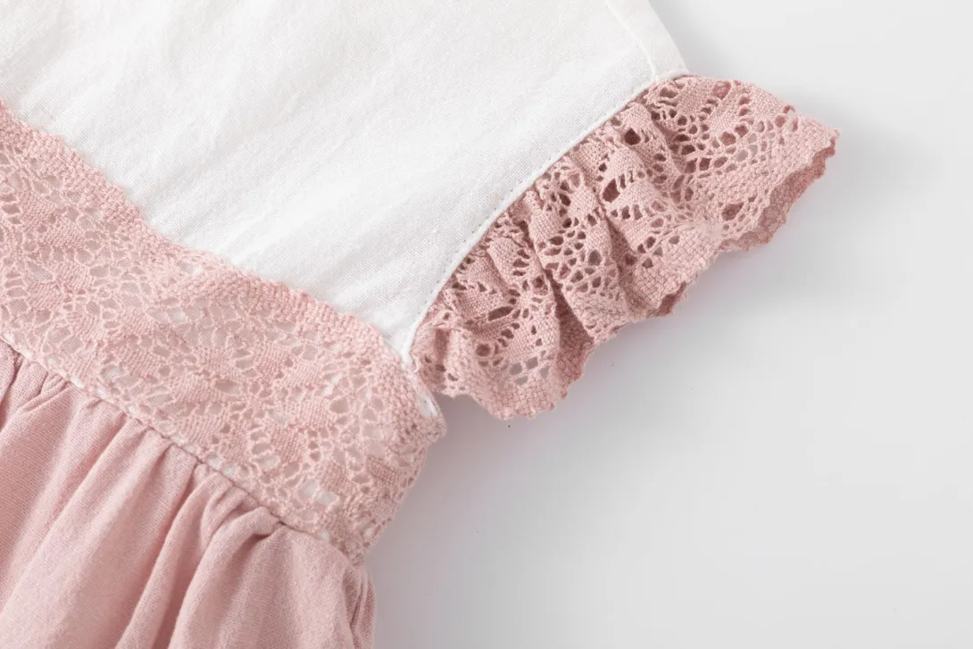 Pink knit garment with ruffled lace trim detail