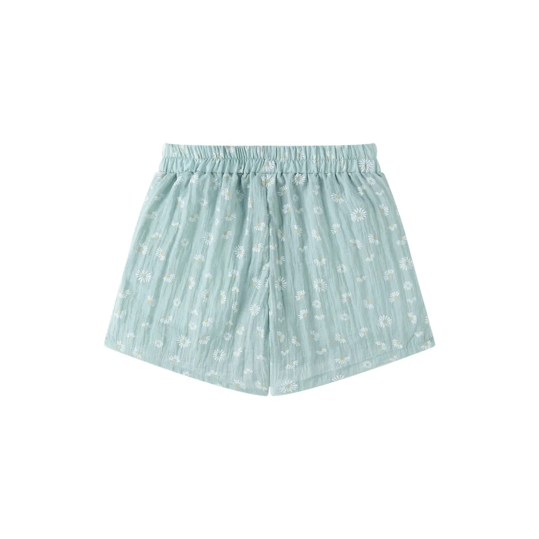 Light blue boxer shorts with white polka dot pattern and elastic waistband