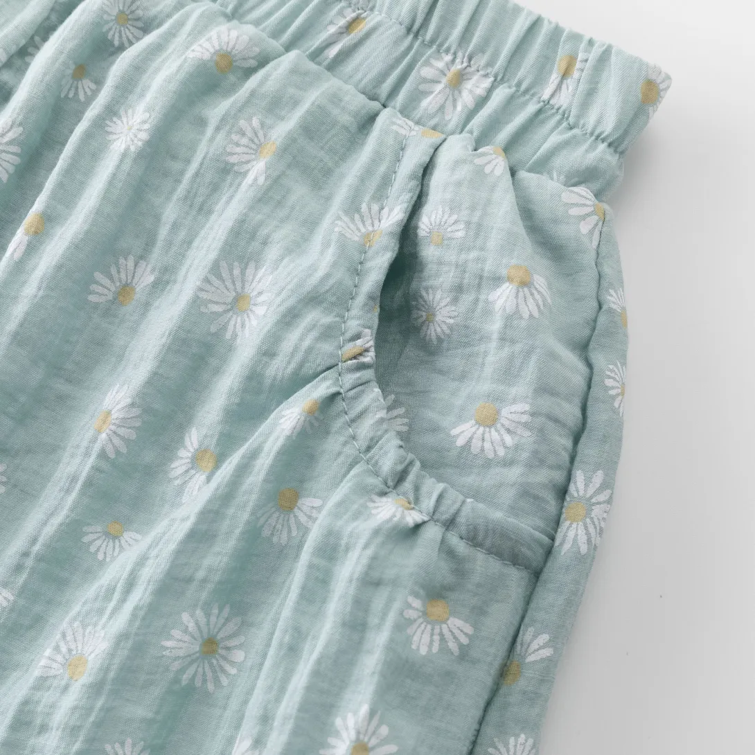 Light blue striped shorts with ruffle detail and elastic waistband