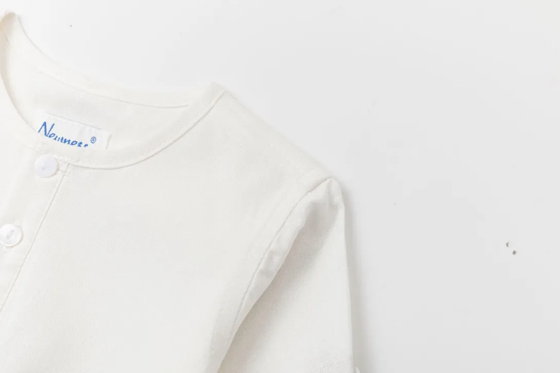 White long-sleeve infant bodysuit with envelope neckline