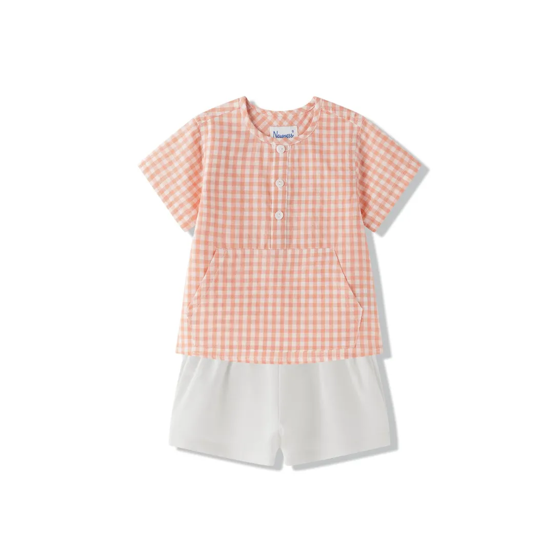 Two-piece outfit with coral gingham short-sleeve top and white shorts