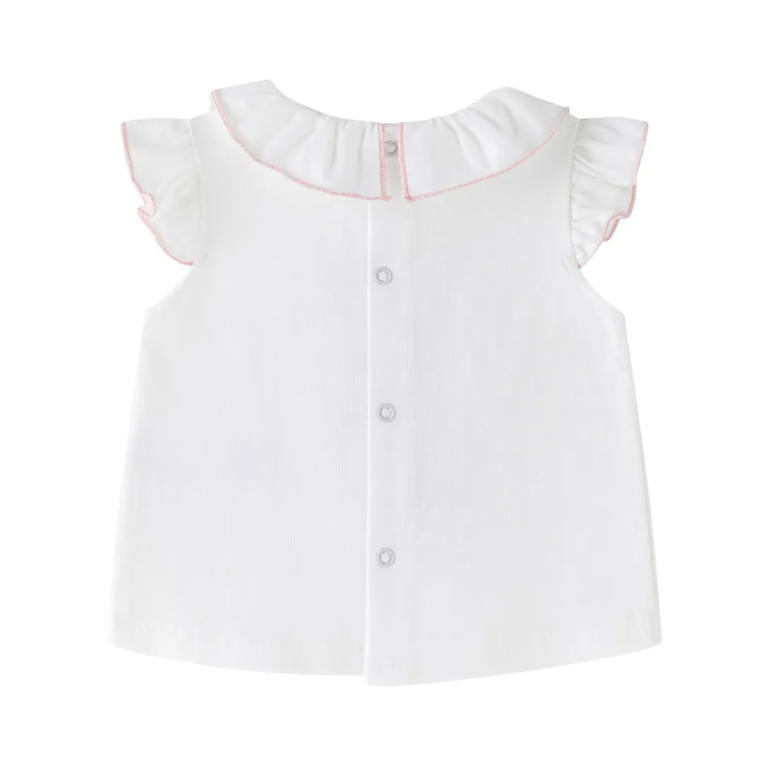 White baby blouse with peter pan collar, flutter sleeves, and button front closure