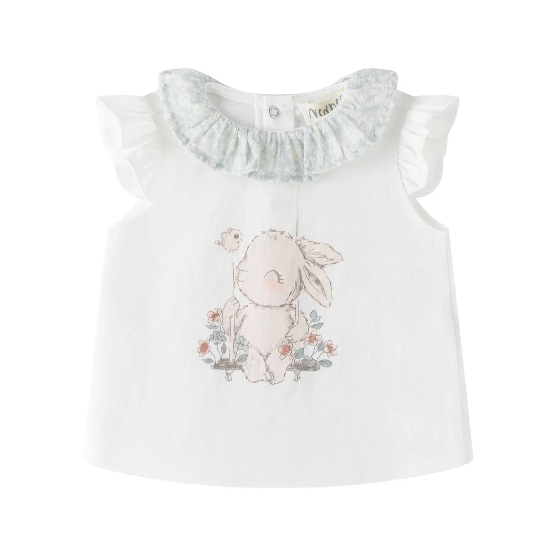 White baby top with ruffled collar and bunny graphic