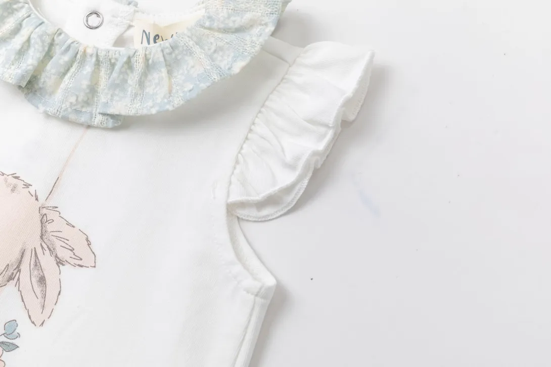 White baby outfit with pink butterfly embroidery and ruffled collar detail