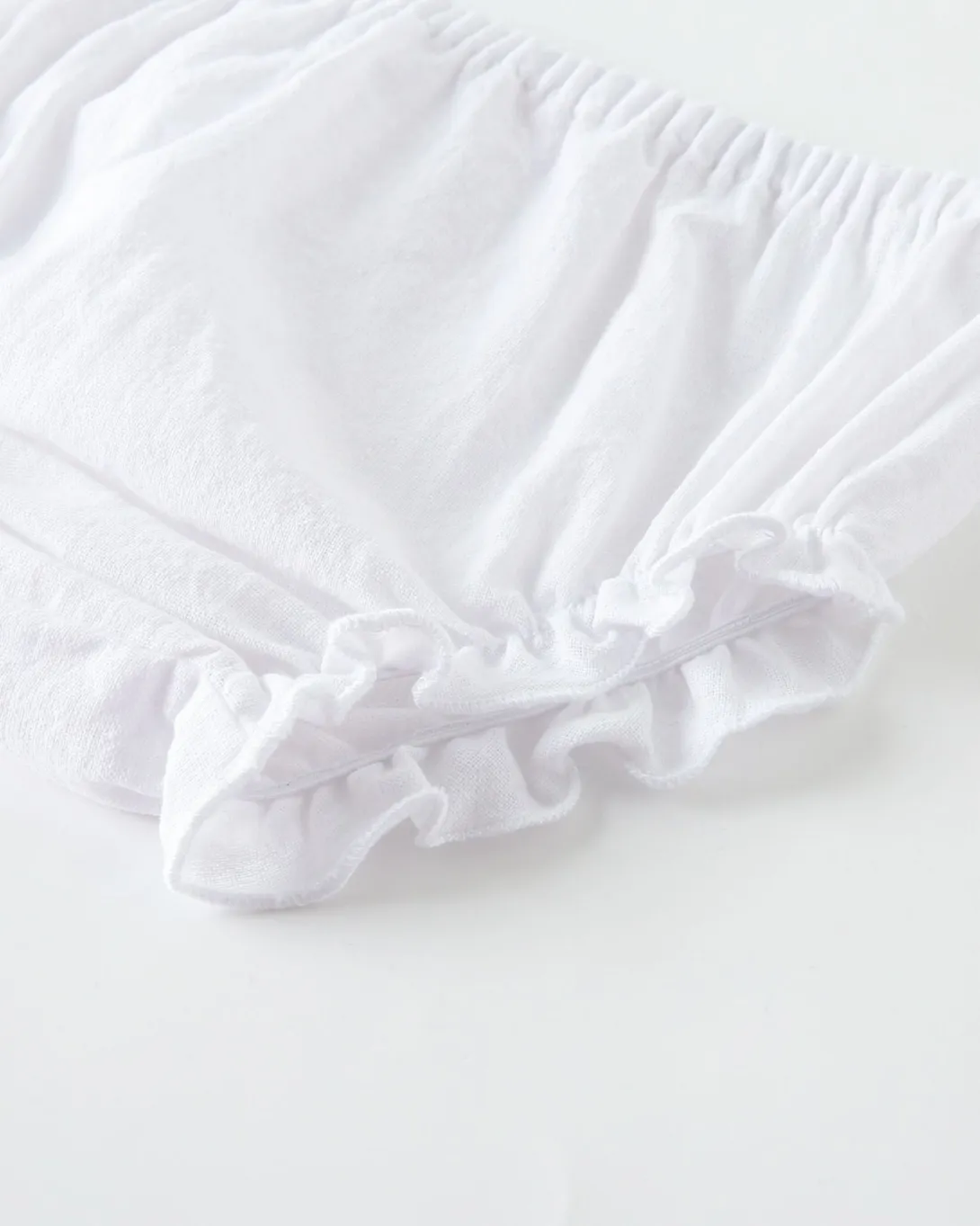 White bloomers with ruffled leg openings