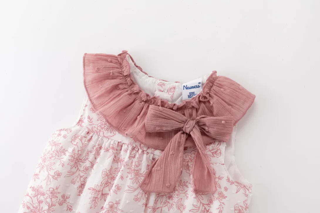 White baby dress with pink floral overlay and ruffle collar