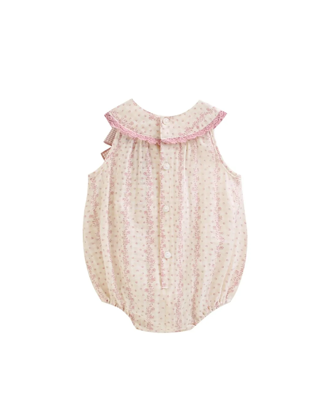 White bubble romper with pink floral print and pink ruffle collar