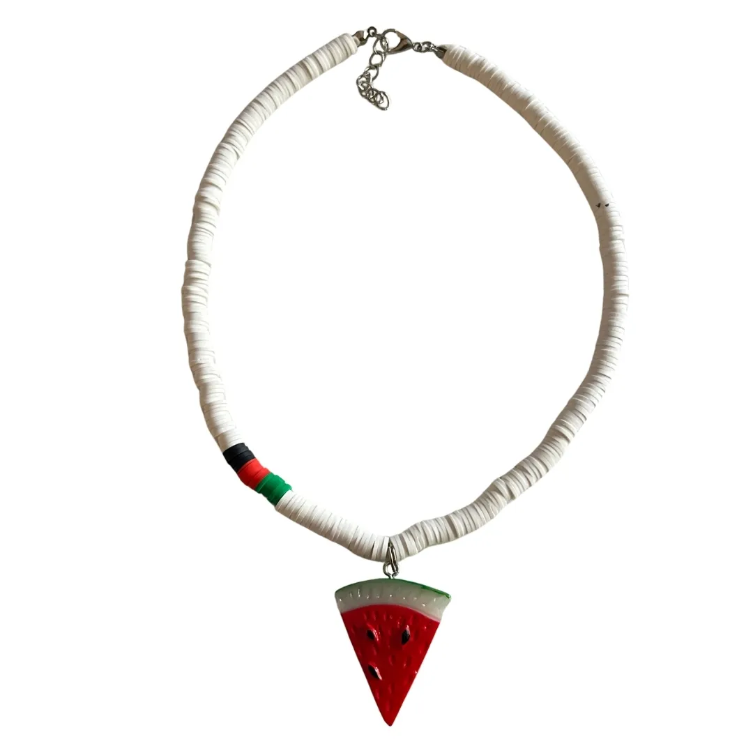 Silver-toned beaded necklace with colorful accents and red triangular pendant