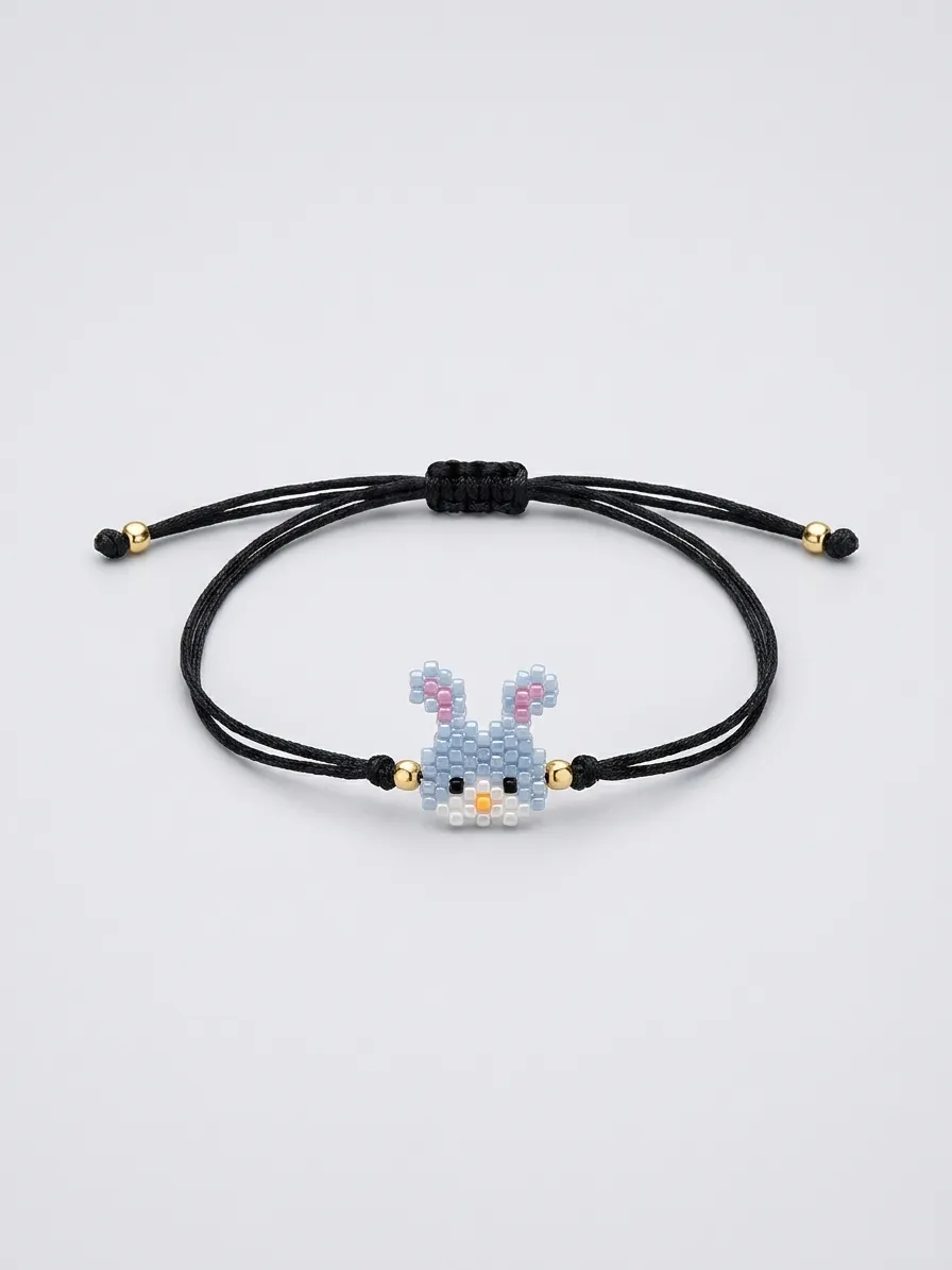 Black cord bracelet with light blue elephant charm