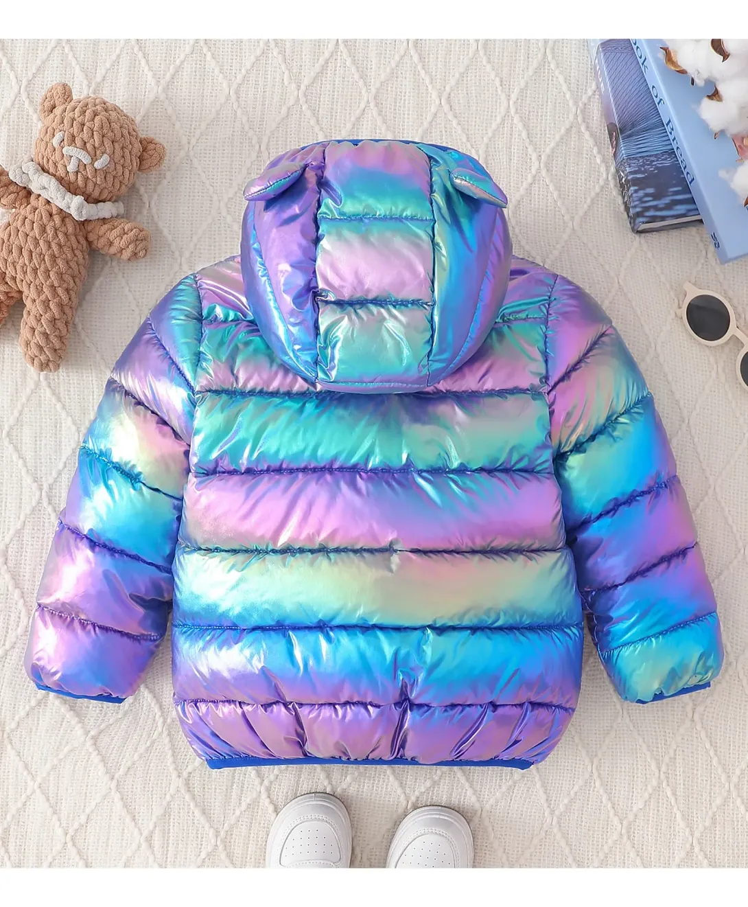 Iridescent striped puffer jacket in rainbow colors with hood