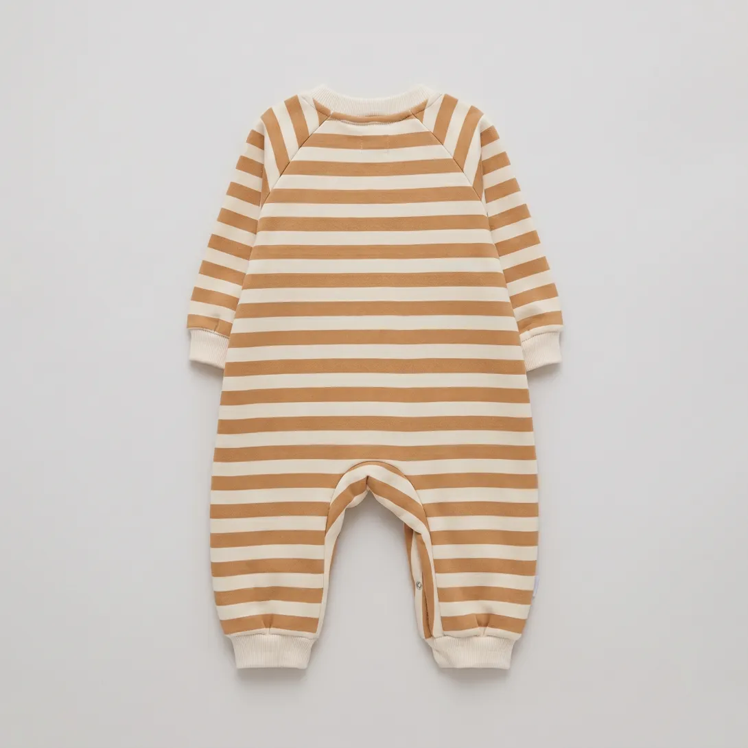 Baby romper with horizontal tan and cream stripes, long sleeves, and snap leg openings