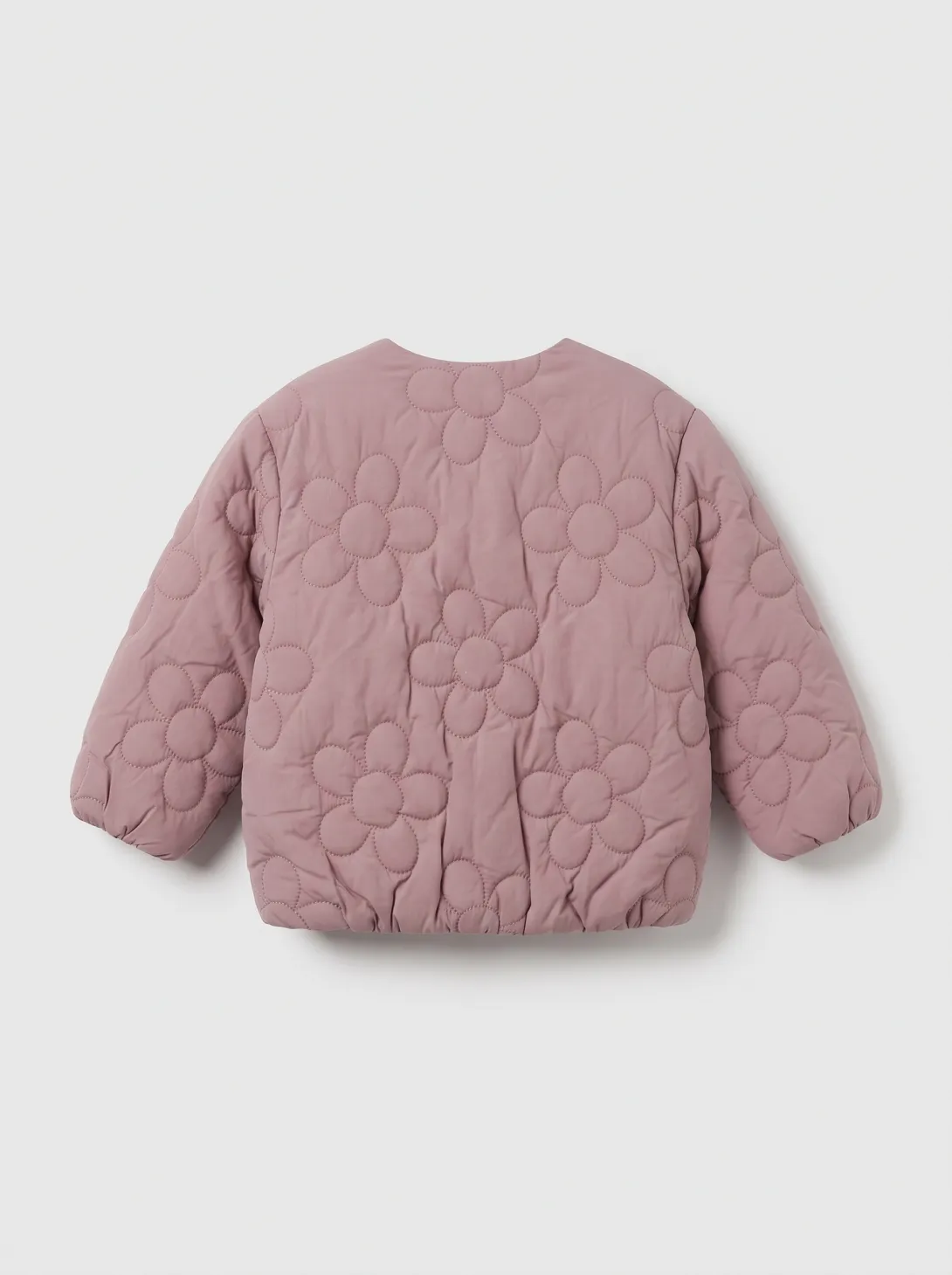 Dusty pink quilted jacket with long sleeves laid flat on white background